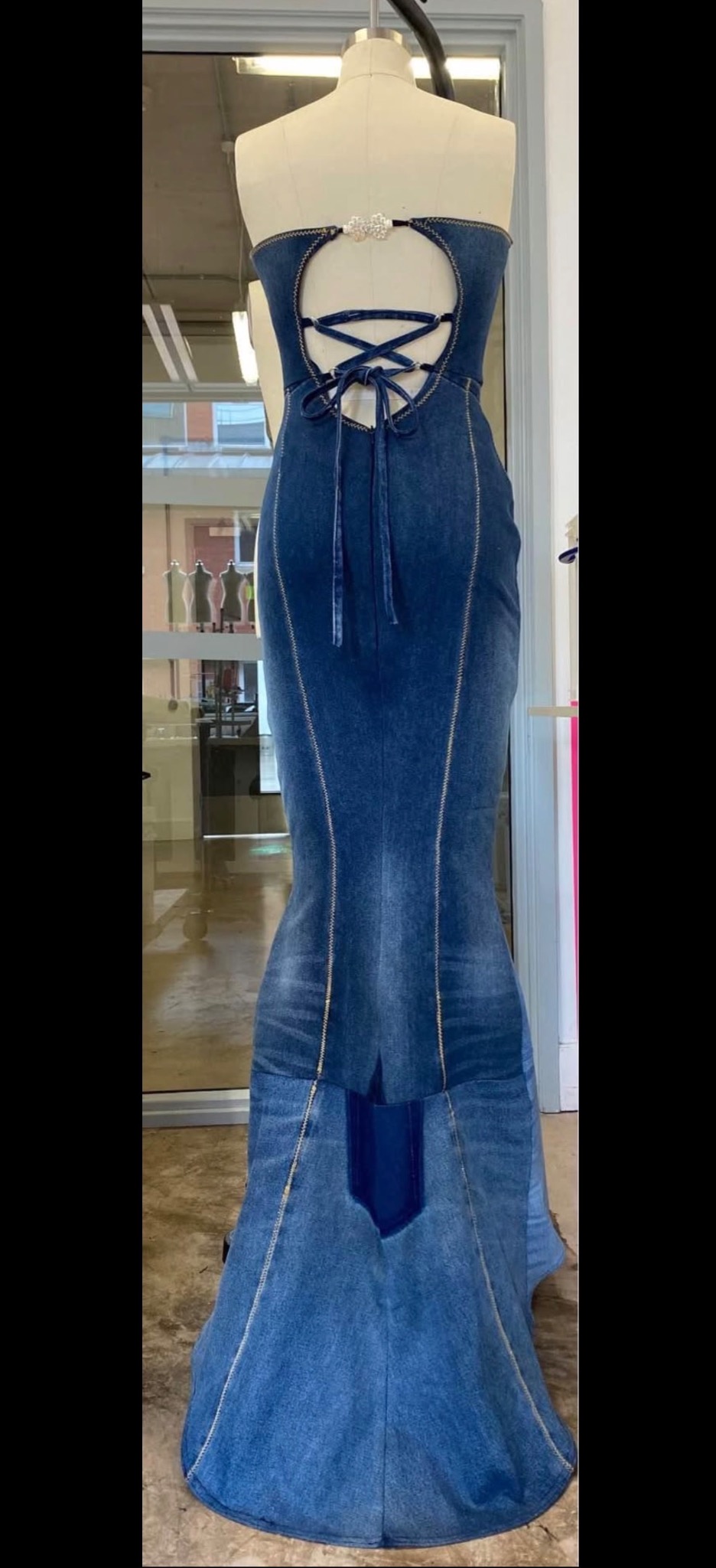 Back view of upcycled denim wedding dress with lace-up detail