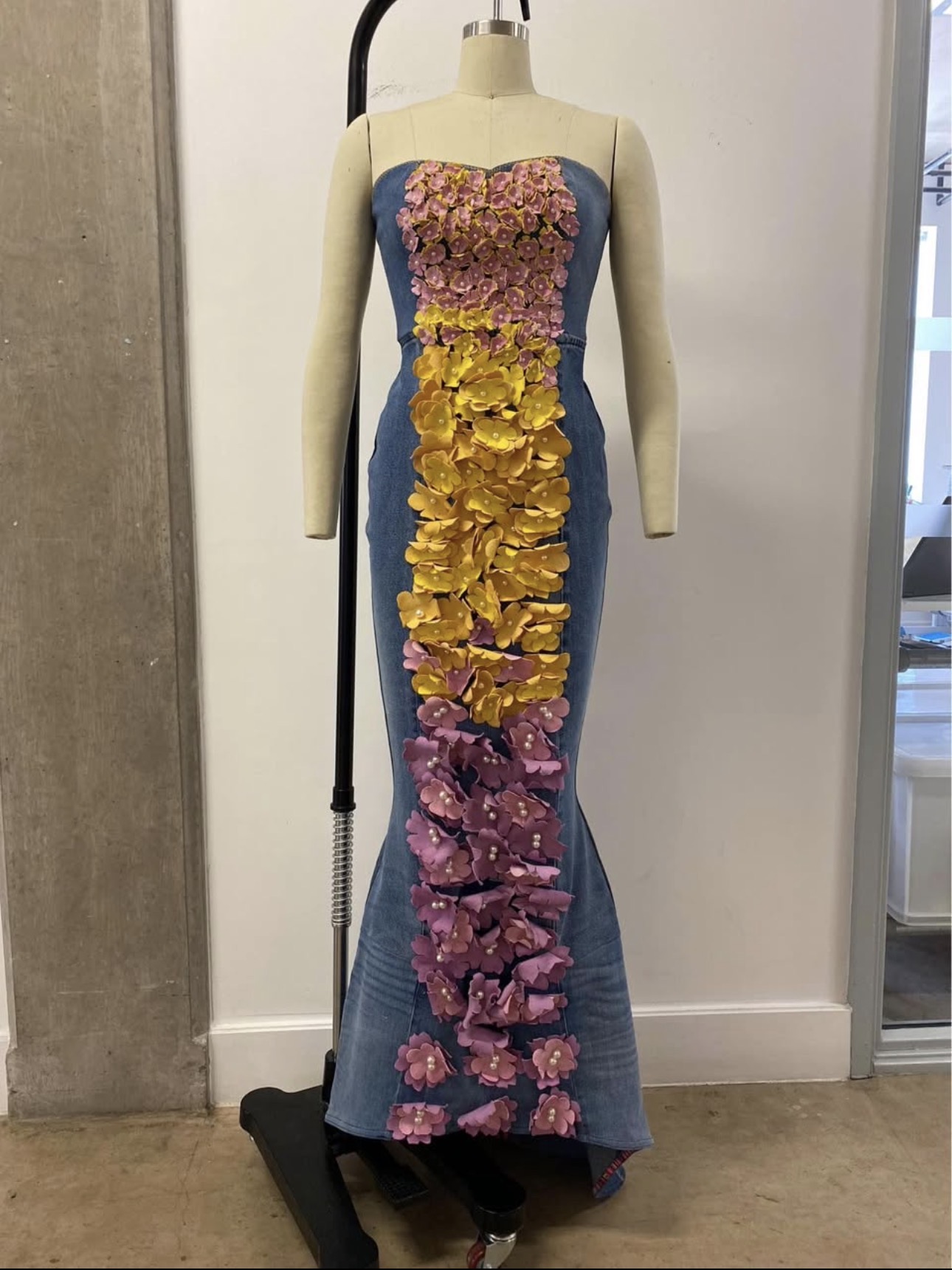 Upcycled denim wedding dress with flower petal detail at the front